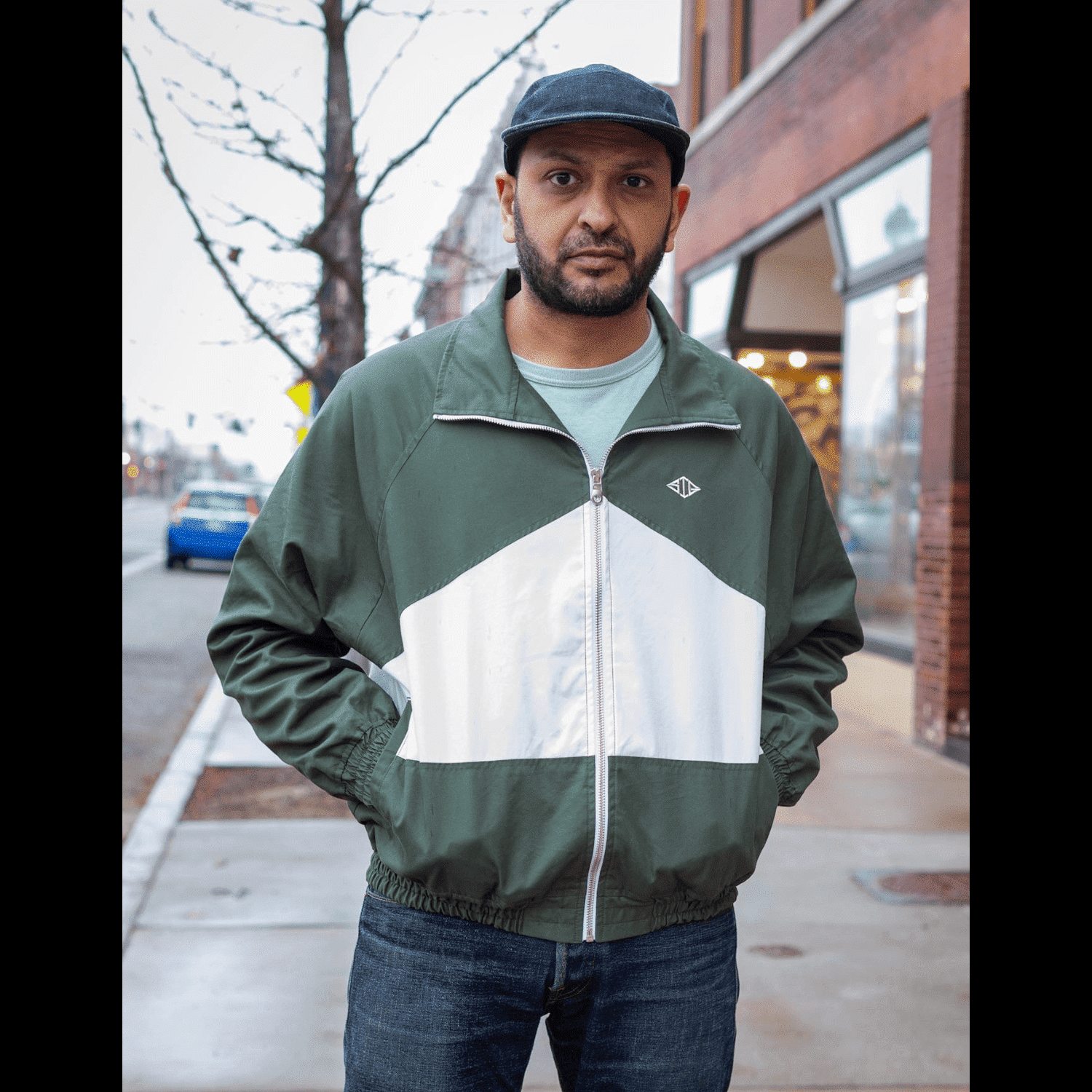 Green Track Jacket by Signature. Main view.