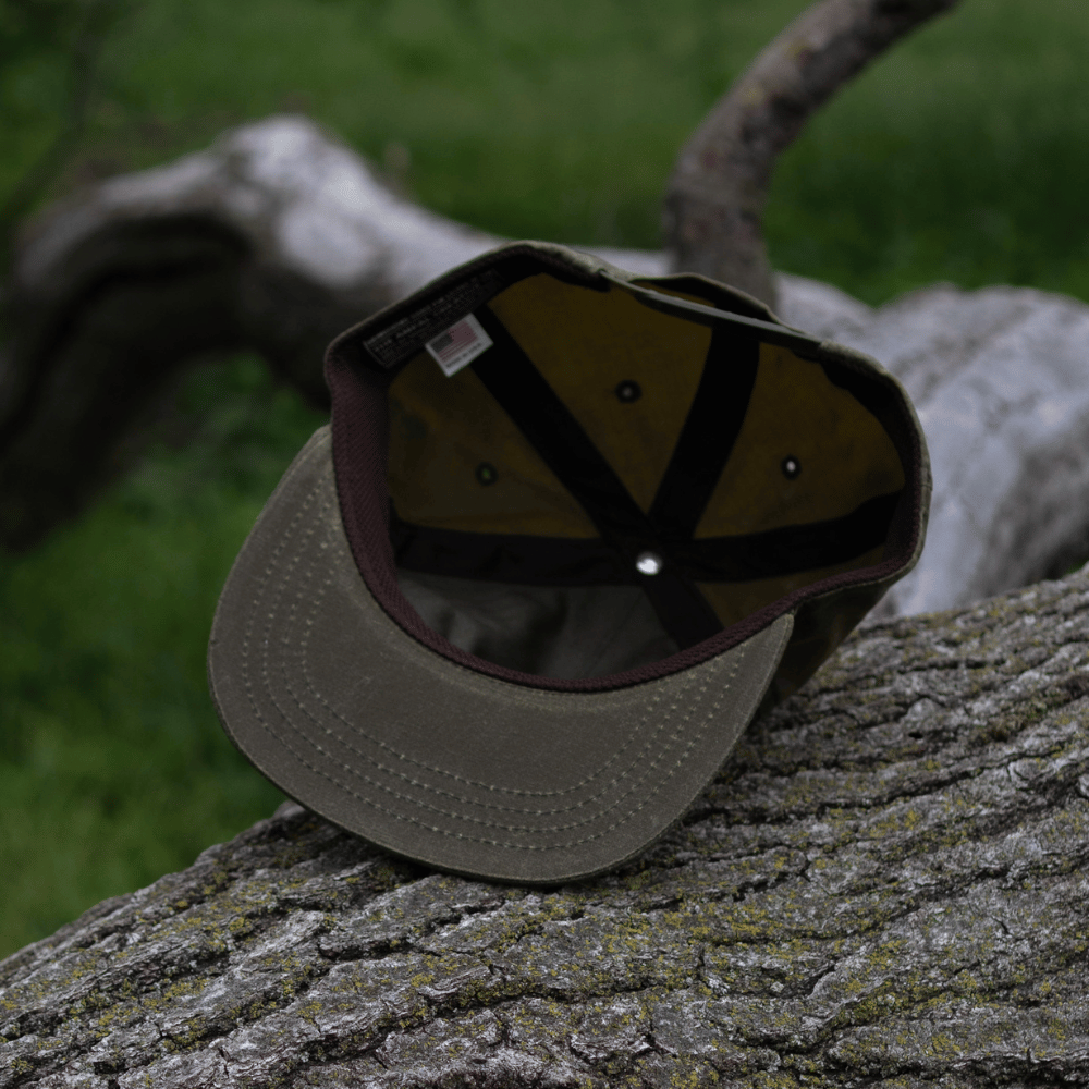 Olive Wax Snapback Hat by The Ampal Creative. Underside view.