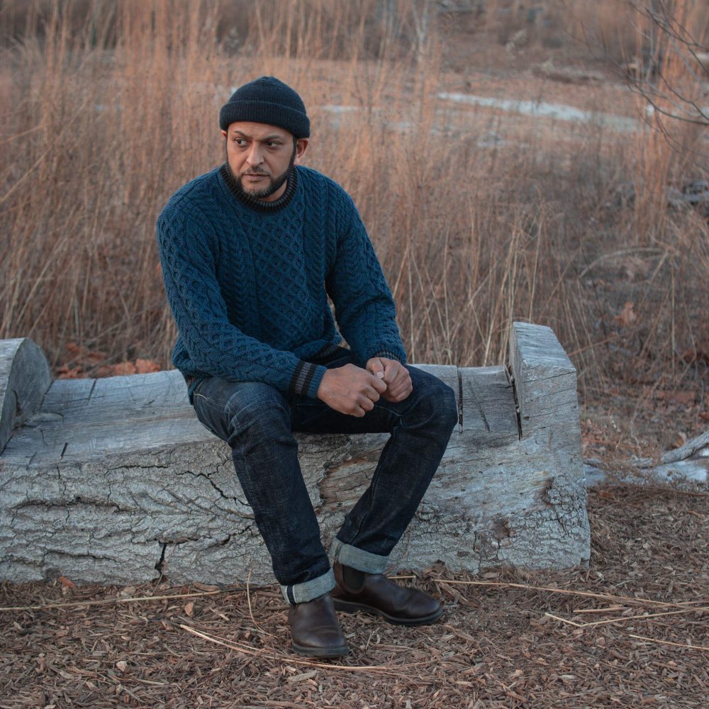 Striped Aran Teal Sweater by Aran Woollen Mills. Sitting view #2.