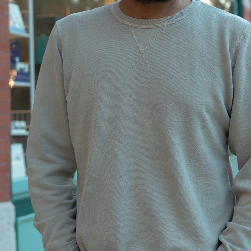 Latte French Terry Sweatshirt. Front worn close-up view.