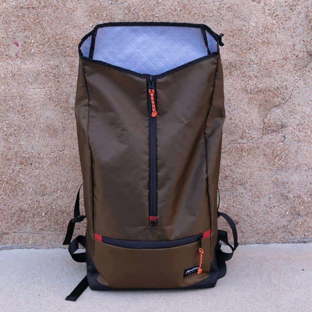 Commuter Center-zip Backpack in Olive by Flowfold. Open flap View.
