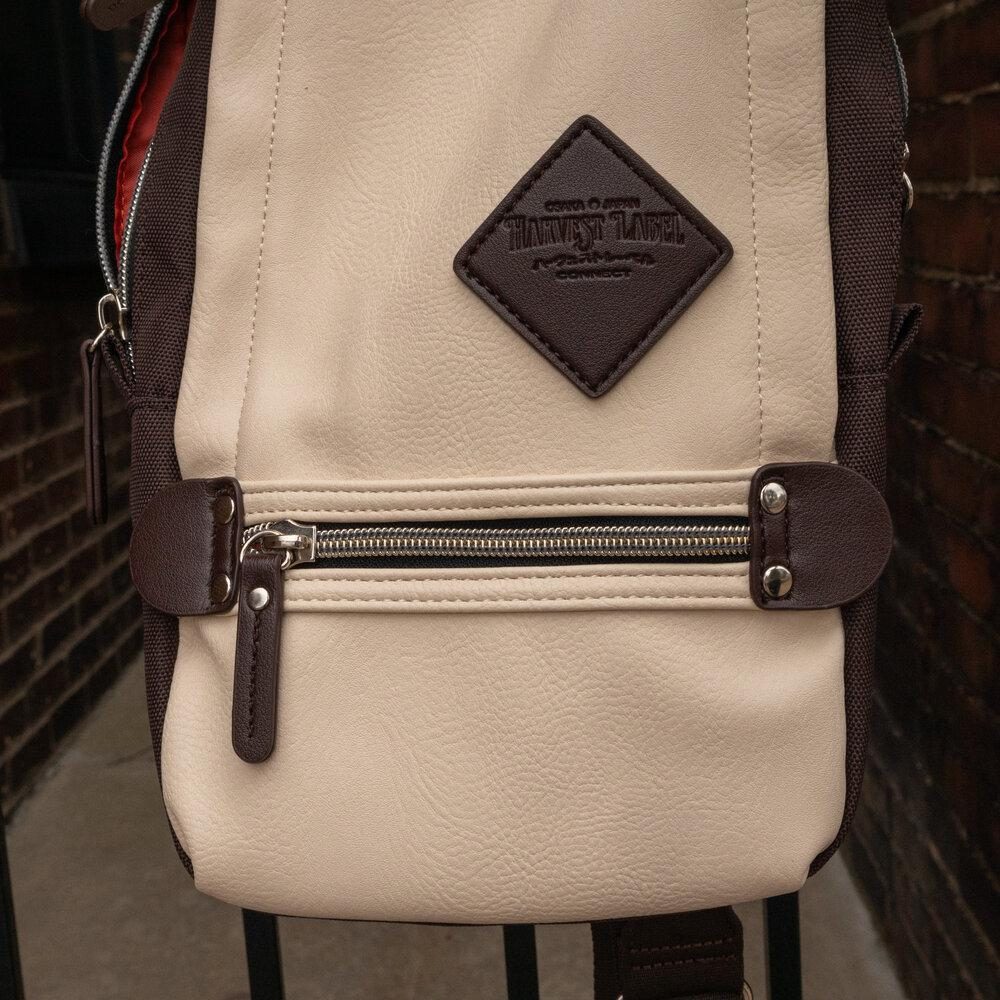 Sling Pack VGN by Harvest Label. Cream front close-up view.