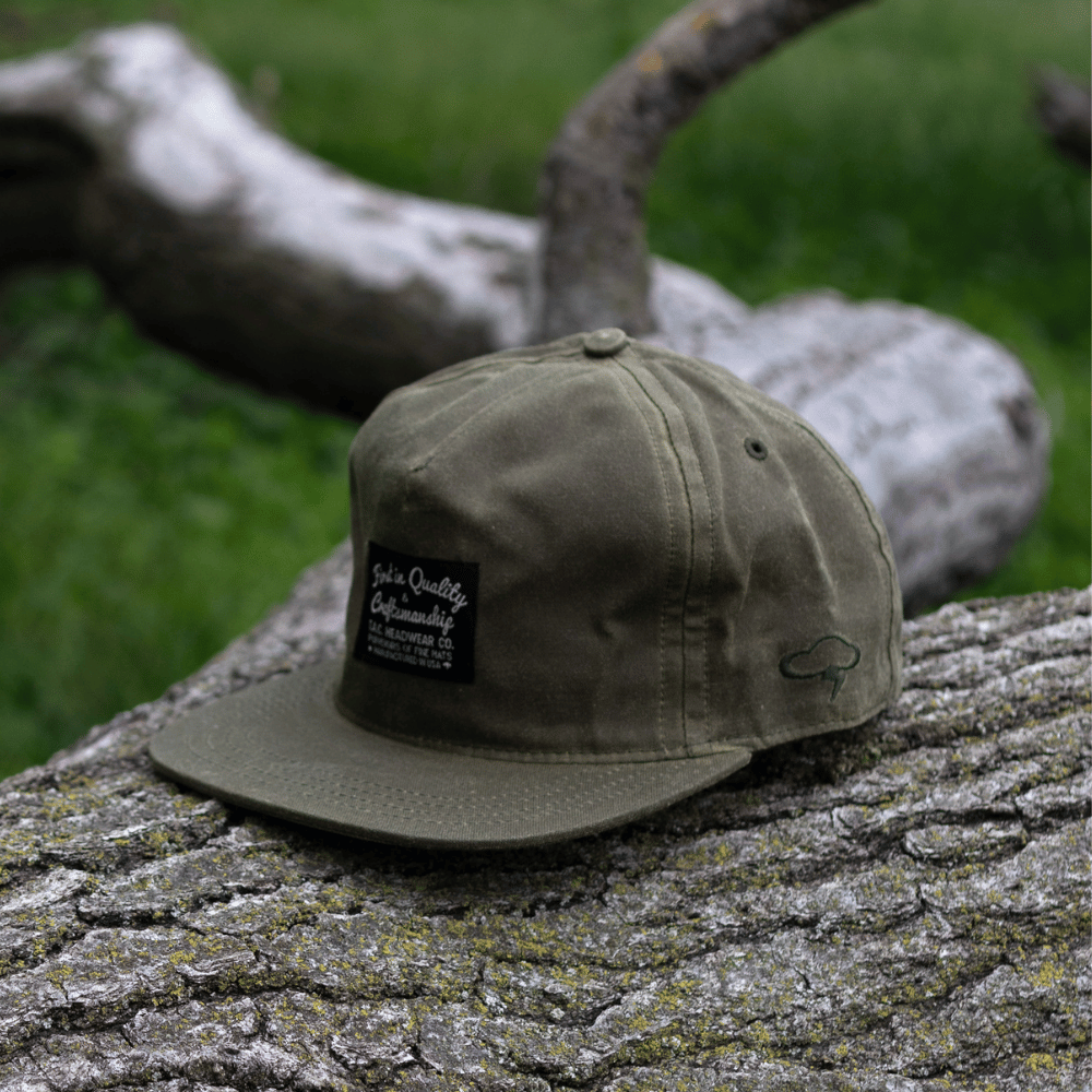 Olive Wax Snapback Hat by The Ampal Creative. Left view.