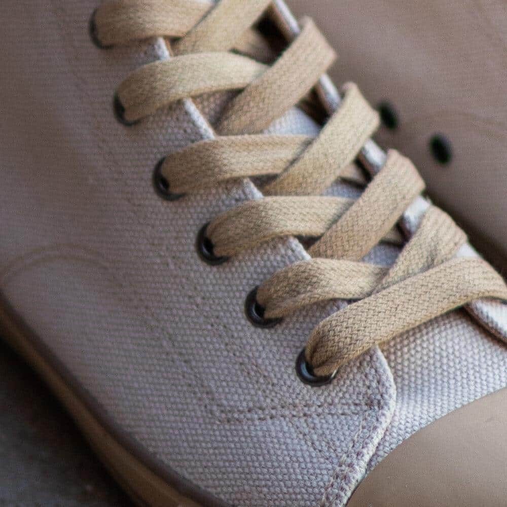 Billy Off-White High Top by Greenergrass. Laces and stitching view.