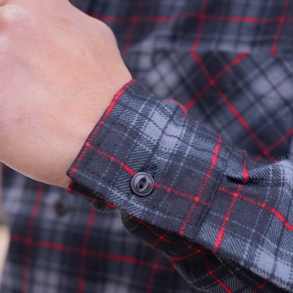 Dark Tartan Flannel Shirt by Upstate Stock. Pattern and button close-up view.