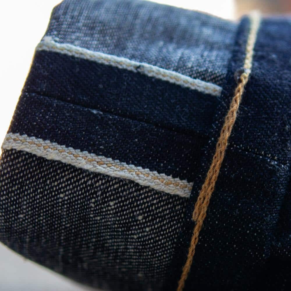 Cobra Nep Selvedge Slim Straight by Crimson Serpents Denim Goods. Chain-stitch hem view.