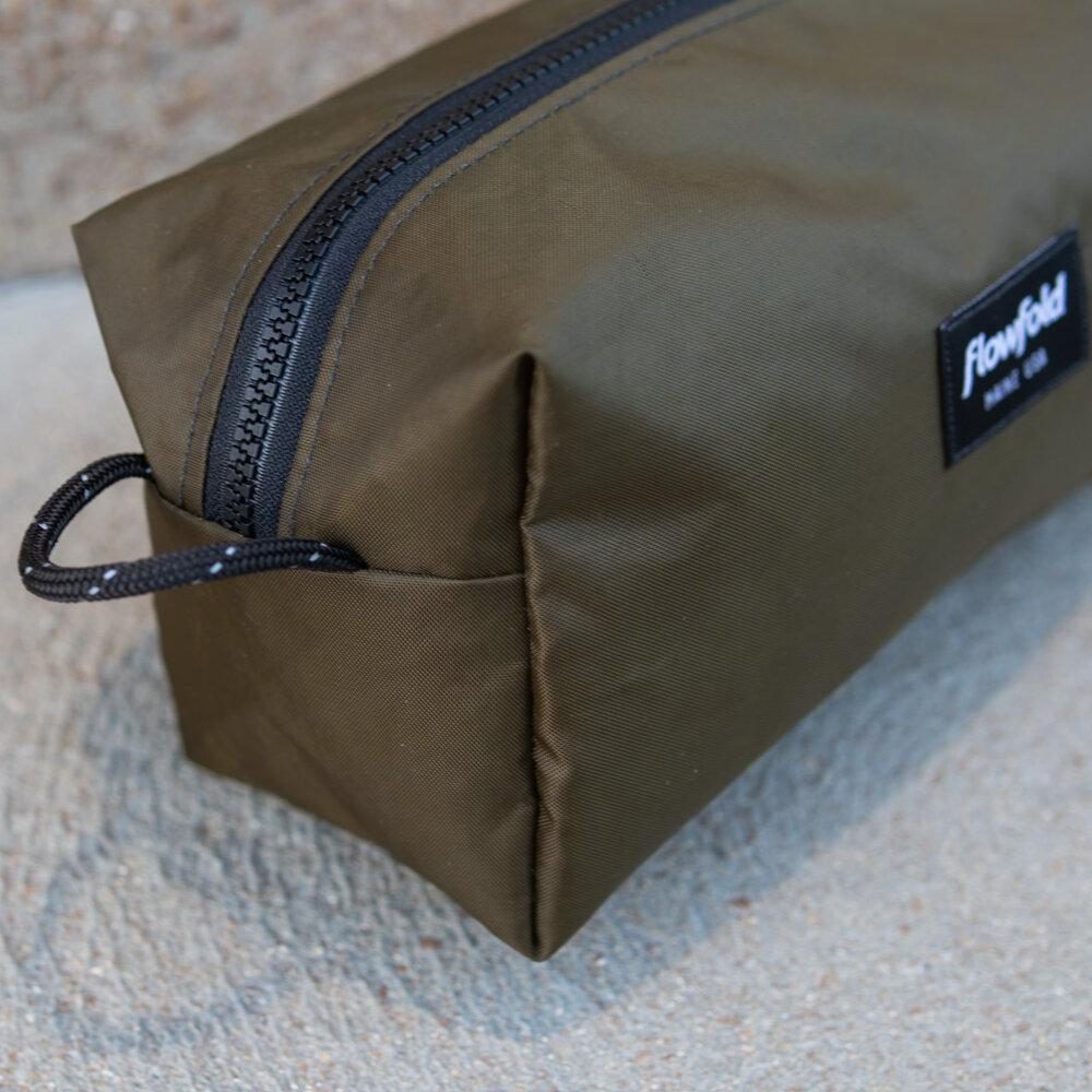 Aviator Toiletry Bag by Flowfold. Loop and zipper view.