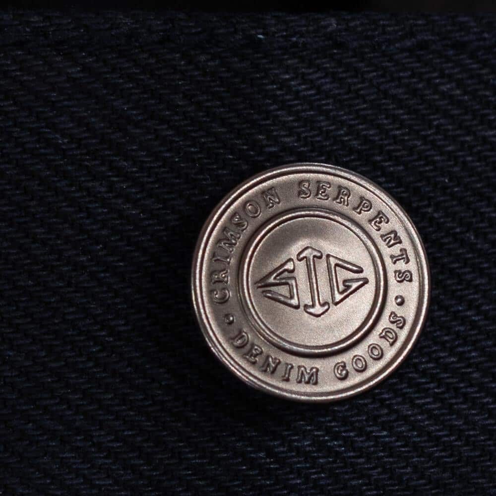 Adder Indigo Black Selvedge by Crimson Serpents Denim Goods. Main button view.